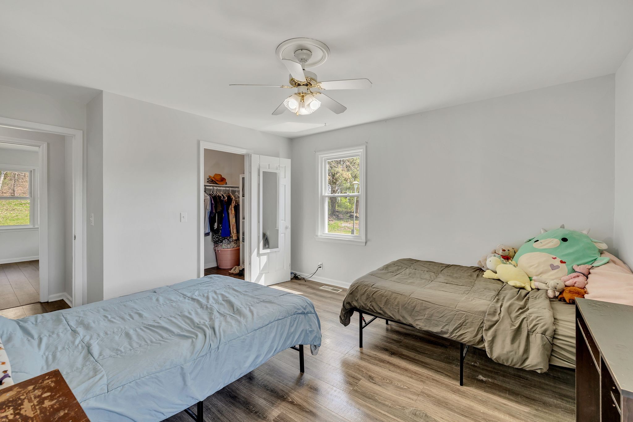 1830 Popes Chapel Road Thompson's Station, TN 37179 - Photo 23 of 53 a bedroom with a bed and a chandelier