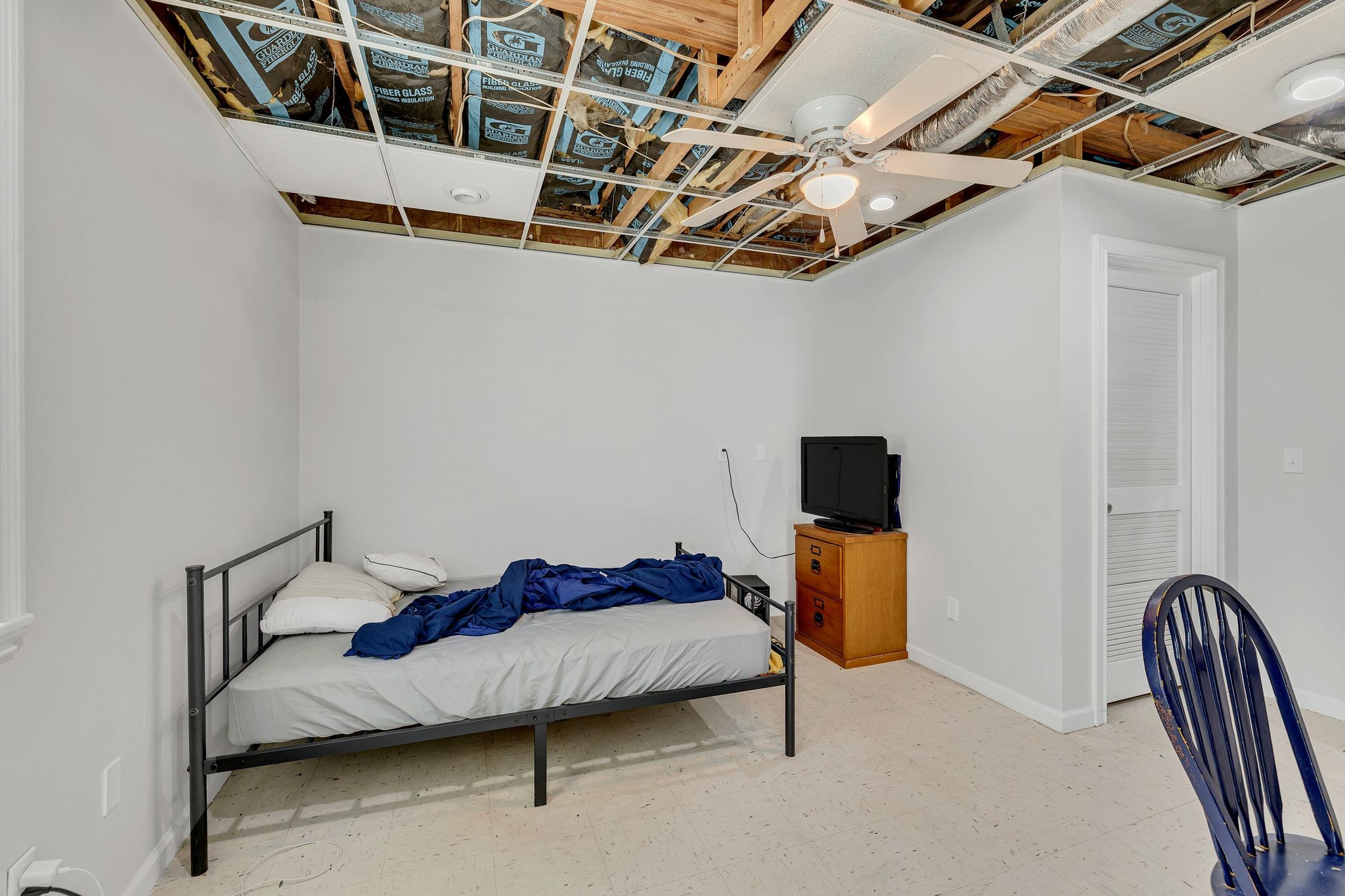 1830 Popes Chapel Road Thompson's Station, TN 37179 - Photo 29 of 53 a bedroom with a bed and a chandelier