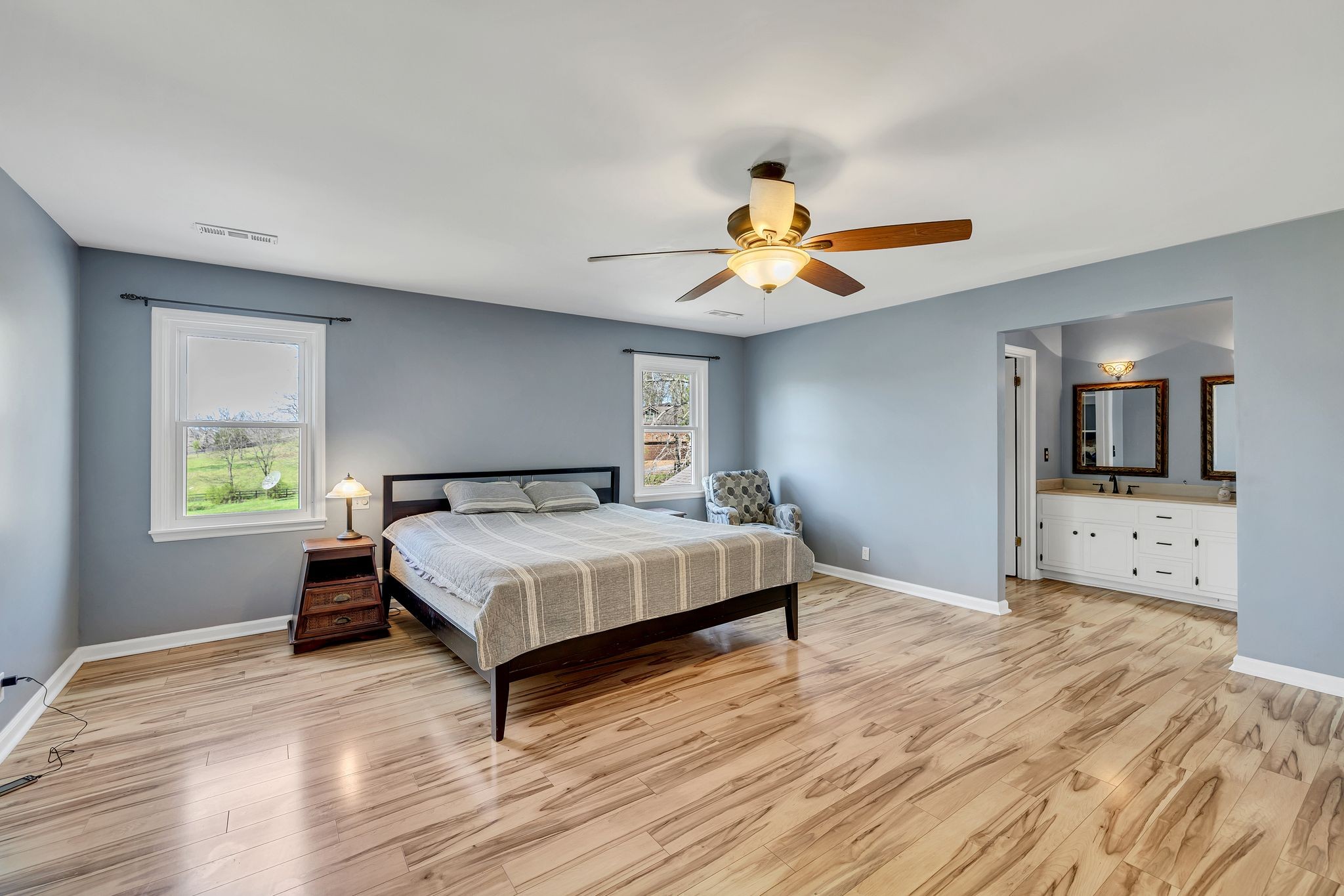 1830 Popes Chapel Road Thompson's Station, TN 37179 - Photo 33 of 53 a bedroom with a bed and a chandelier