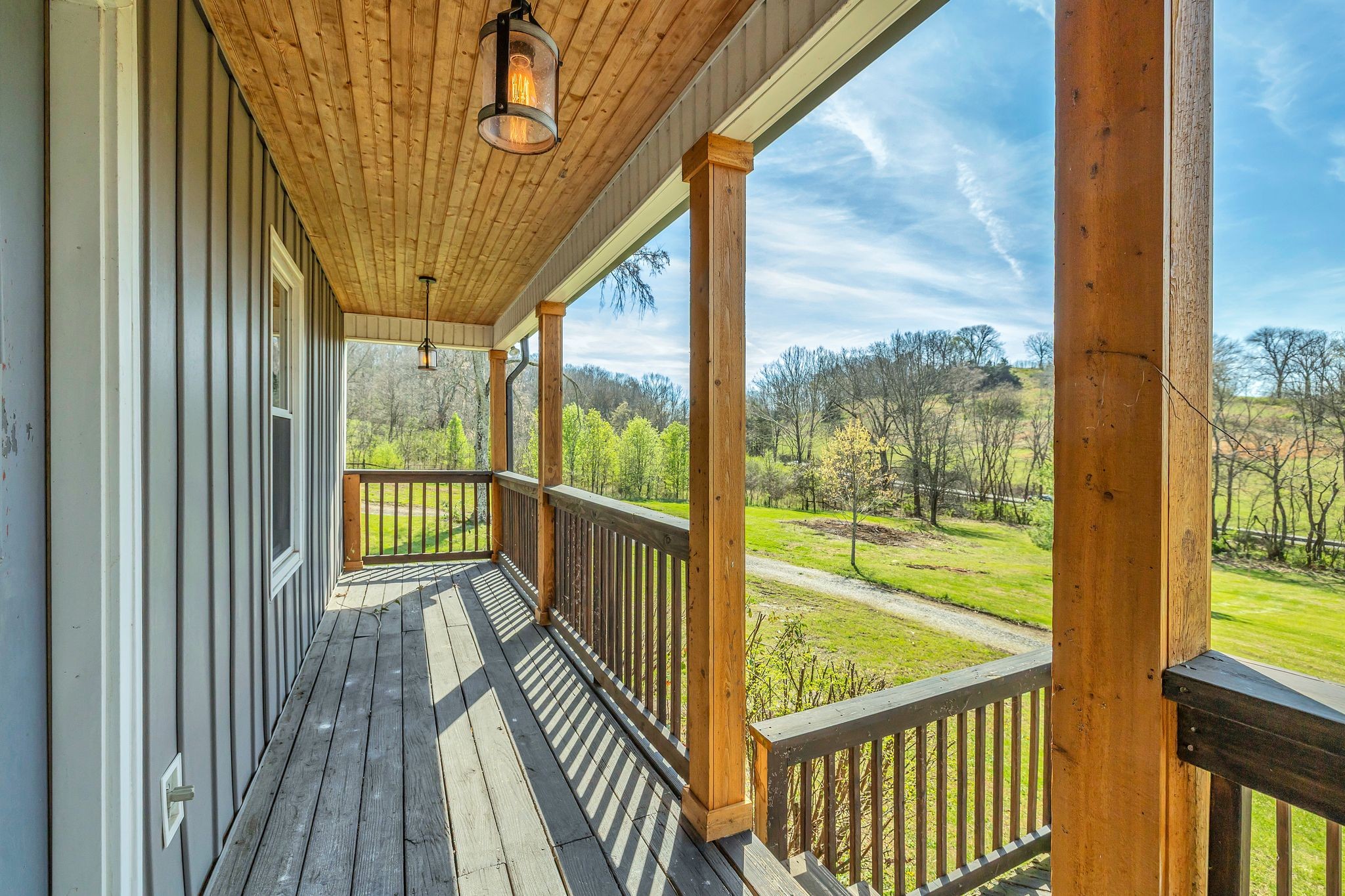 1830 Popes Chapel Road Thompson's Station, TN 37179 - Photo 6 of 53 a view of a balcony with wooden floor