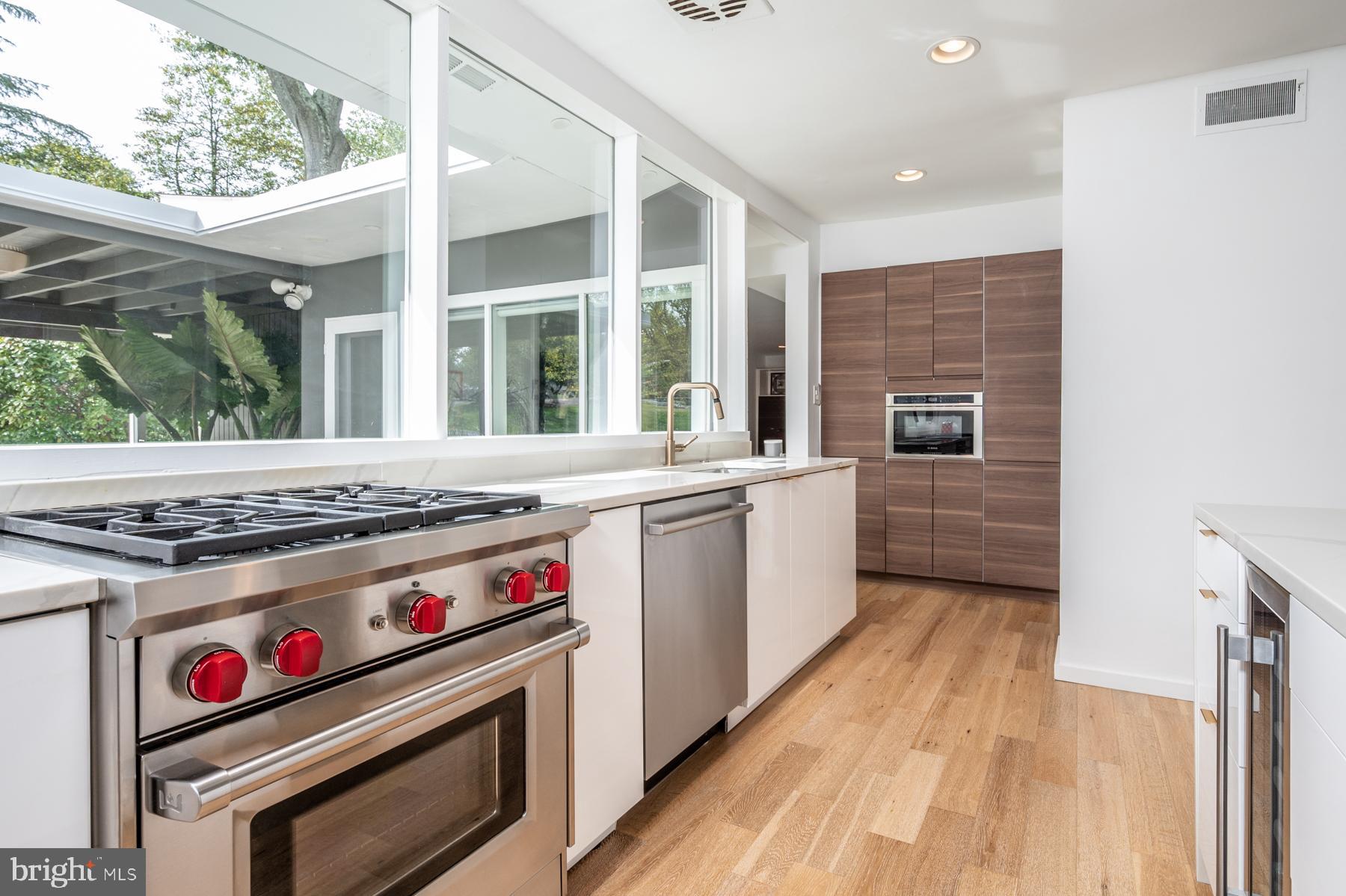 2104 Marthas Road Alexandria, VA 22307 - Photo 14 of 55 Sleek white cabinets, wolf range and wine fridge