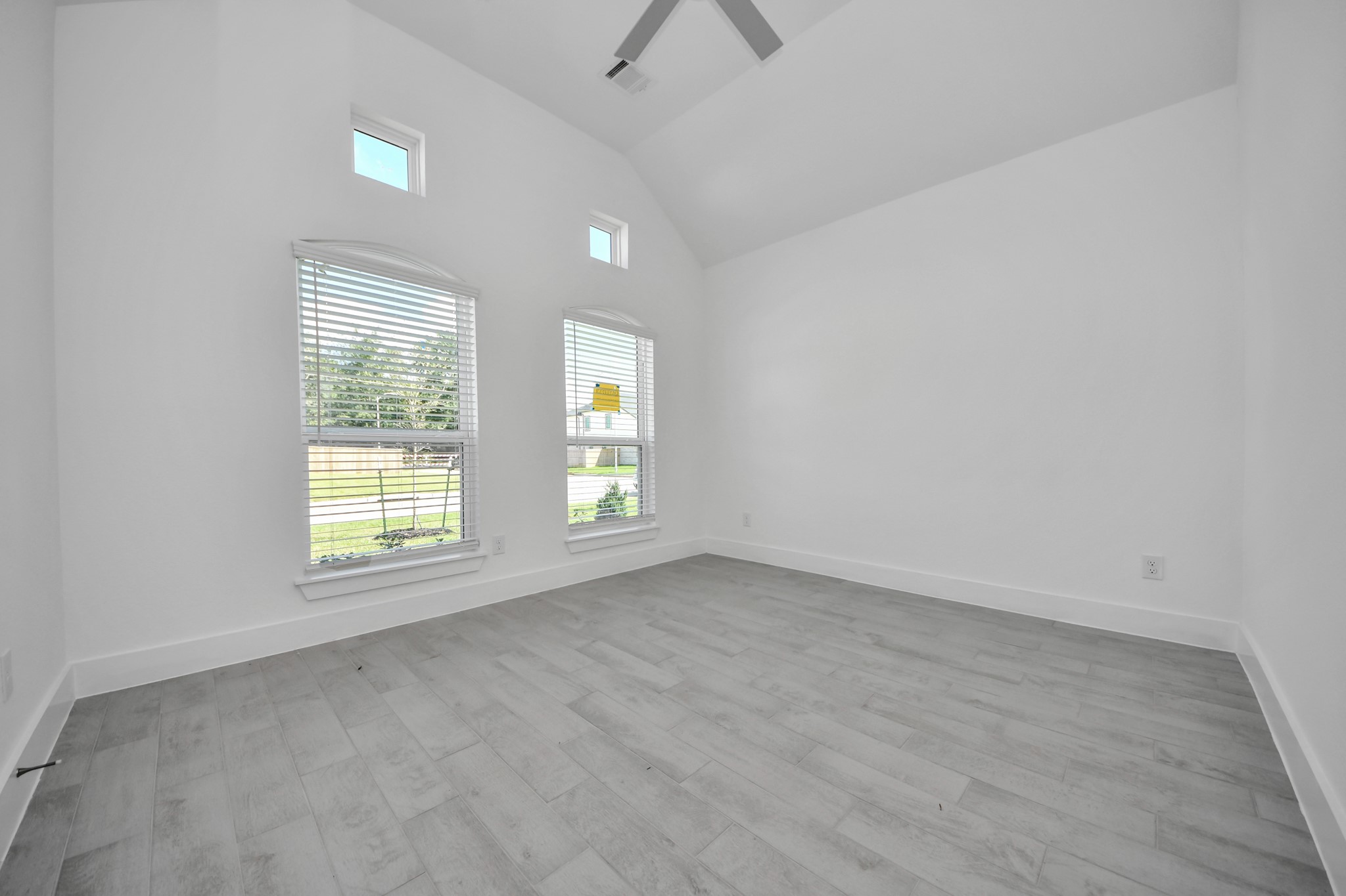 3042 Native Spg Drive Spring, TX 77373 - Photo 8 of 40 Step into the inviting home office, where elegant tile flooring adds a touch of freshness and comfort to the workspace. Natural light pours through the window, creating an inspiring environment for productivity and focus.