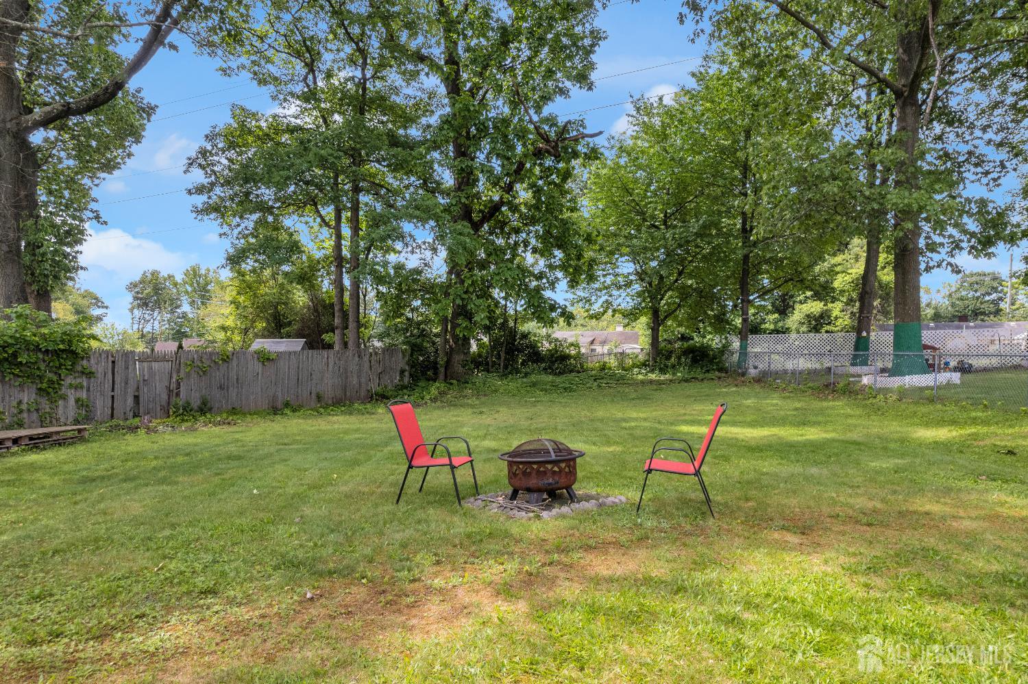 4 Dayton Road Edison, NJ 08817 - Photo 12 of 14 a backyard with water fountain and trees