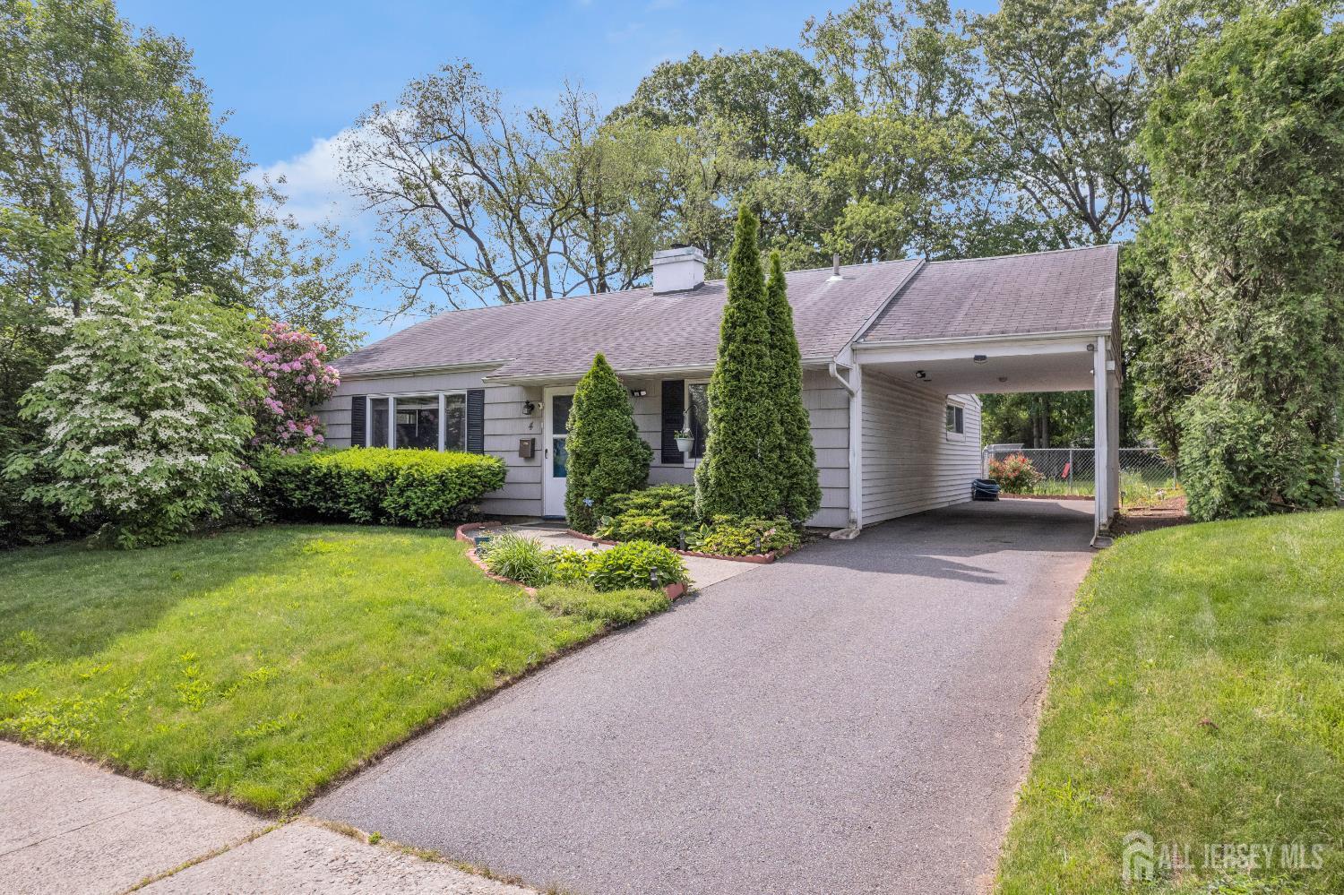 4 Dayton Road Edison, NJ 08817 - Photo 2 of 14 a view of a house with a garden