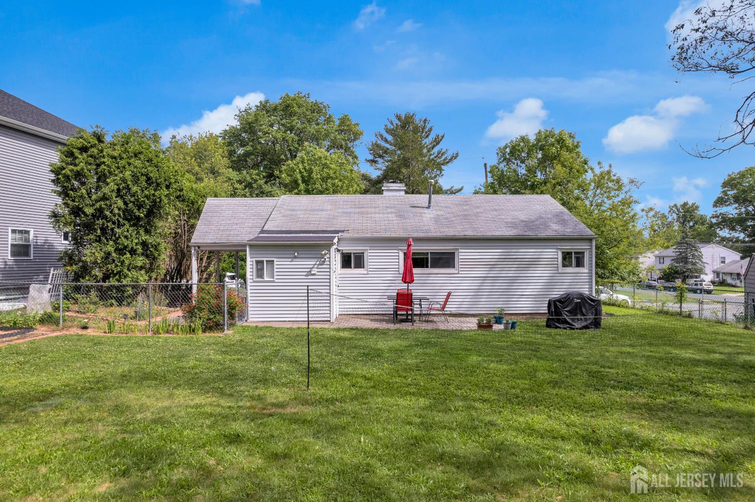 4 Dayton Road Edison, NJ 08817 - Photo 6 of 14 a view of a house with a yard