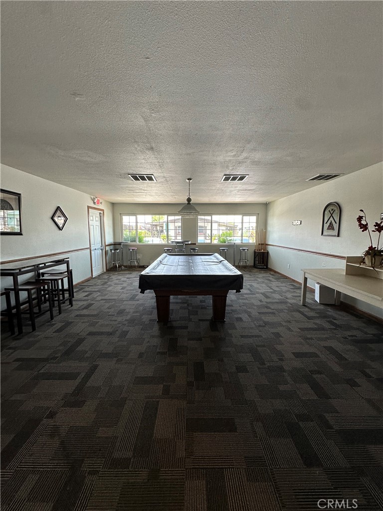 3825 Crestmore Road, Unit 414 Riverside, CA 92509 - Photo 25 of 31 a living room with furniture