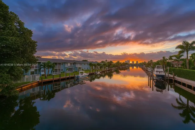 a view of a lake with a city