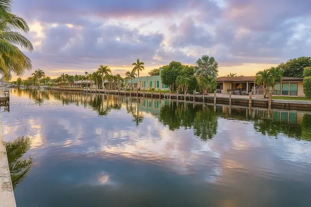 a view of a lake with a city
