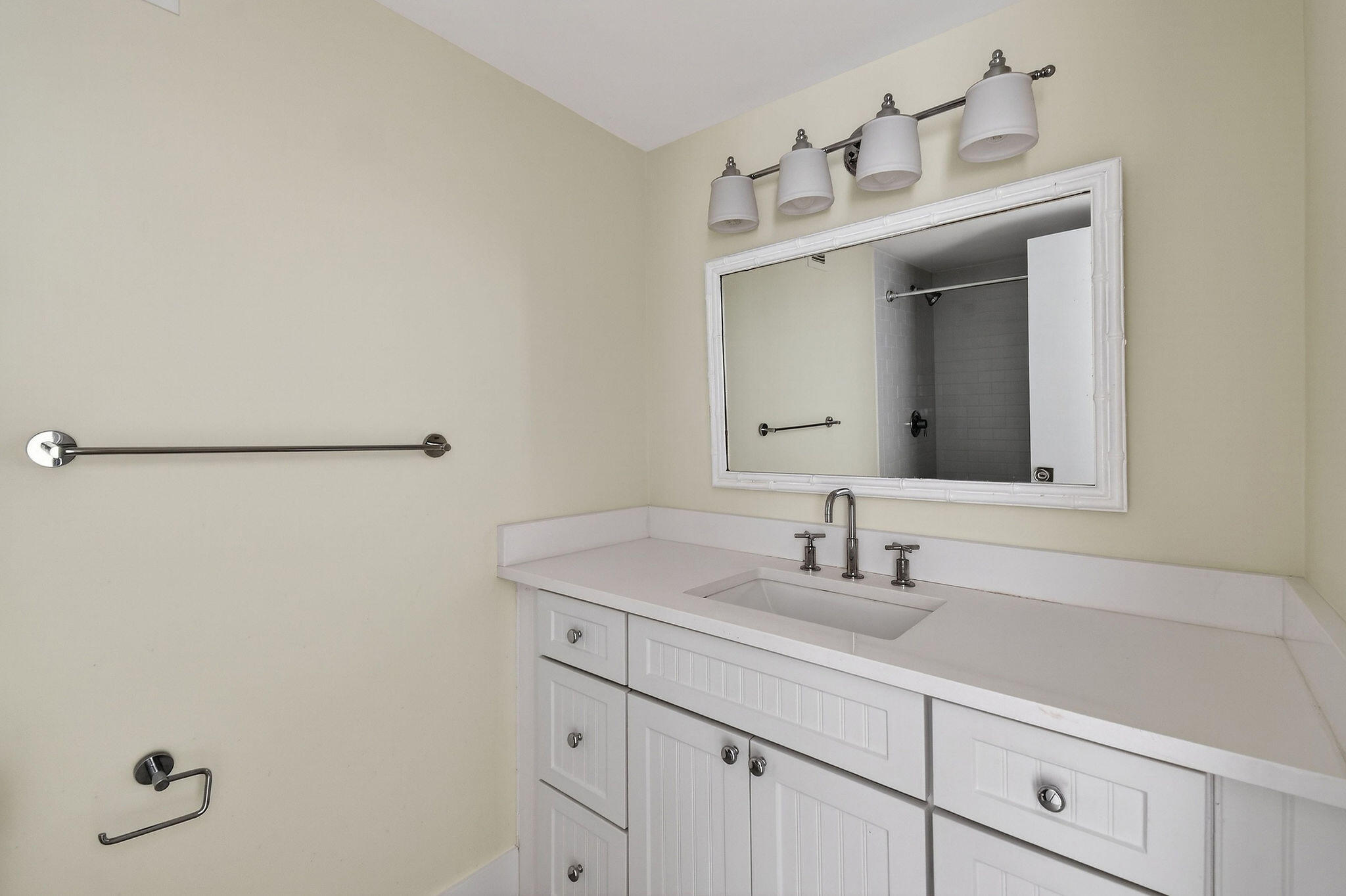 3800 Washington Road, Unit 712 West Palm Beach, FL 33405 - Photo 24 of 48 a bathroom with a sink and a mirror