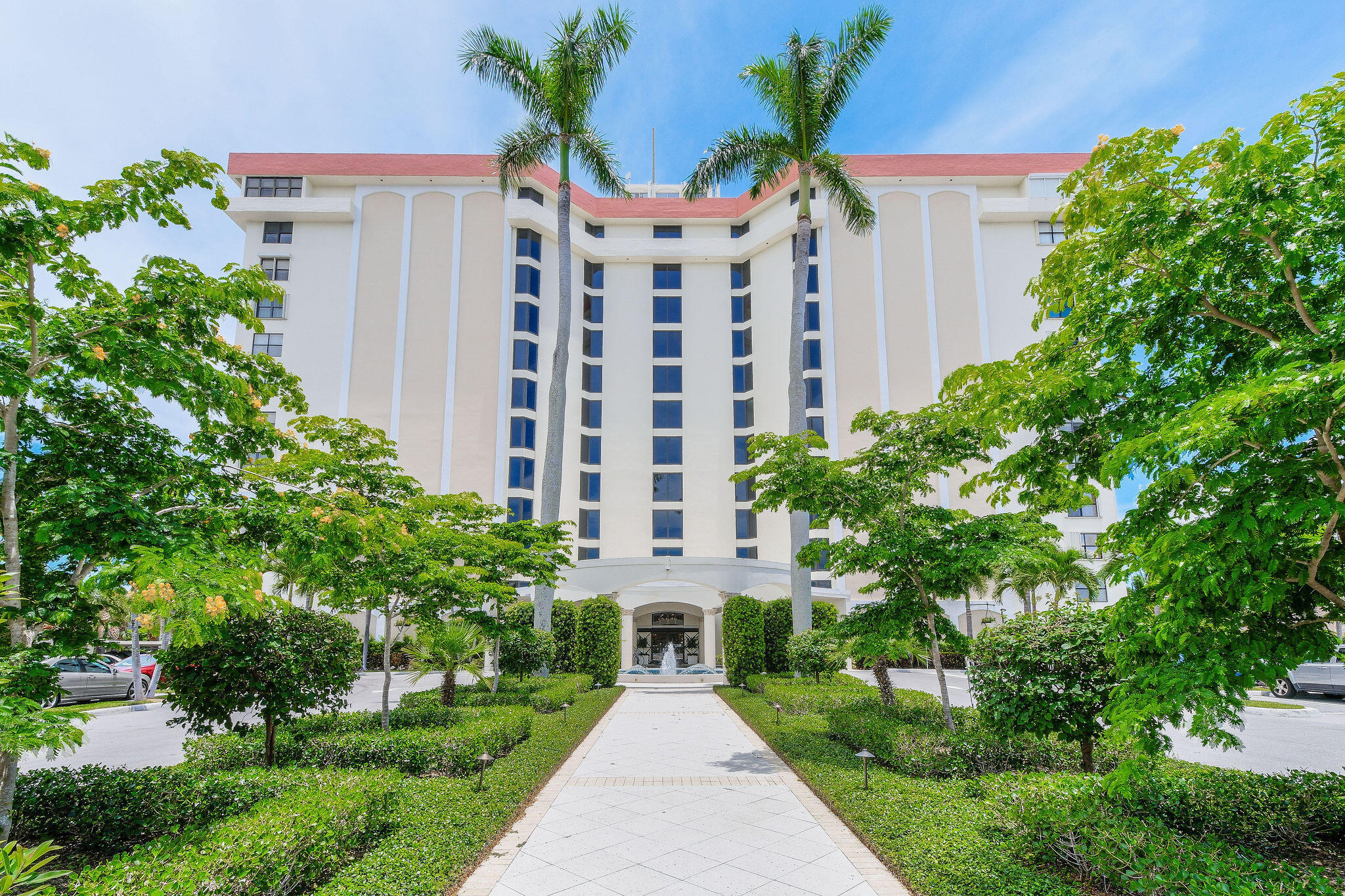 3800 Washington Road, Unit 712 West Palm Beach, FL 33405 - Photo 31 of 48 a front view of building with yard