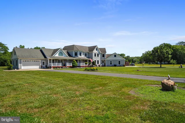 a view of a house with a big yard
