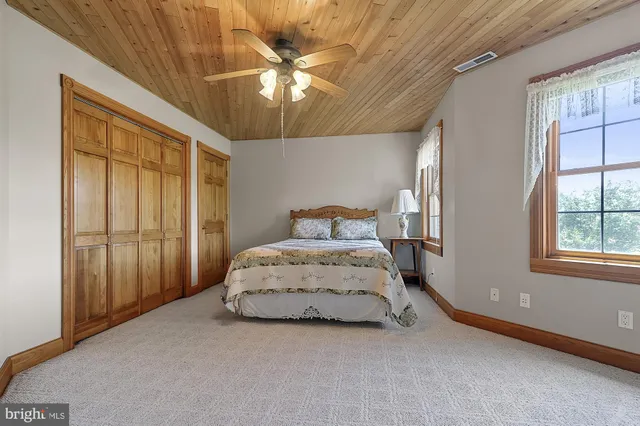 a kitchen with lots of counter top space and dining table