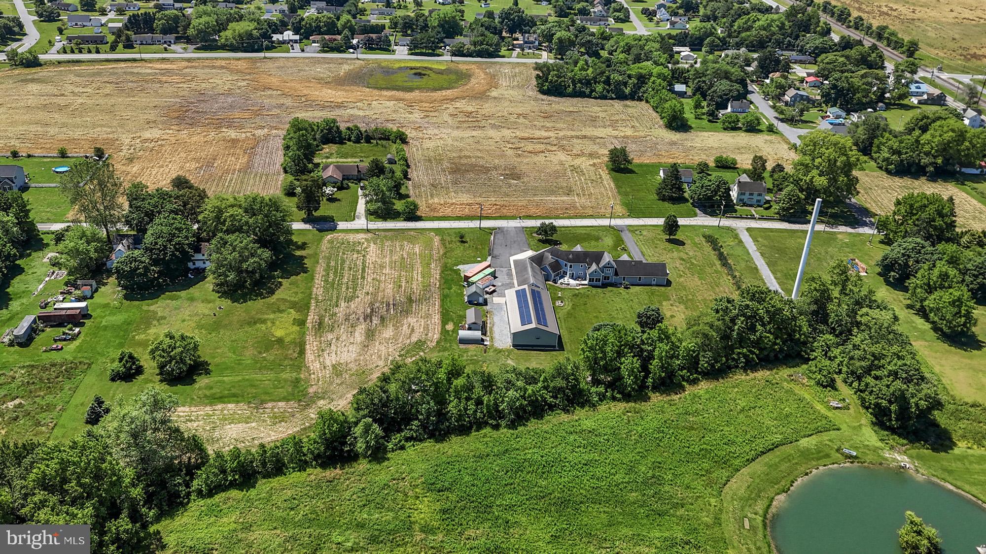 302 East Howard Street Viola, DE 19979 - Photo 56 of 60 an aerial view of a house with a garden
