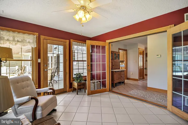 a view of a livingroom with furniture and windows