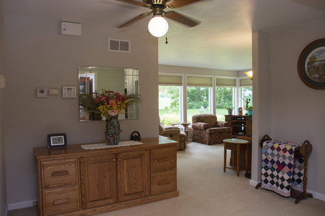 26883 Capp Road Sterling, IL 61081 - Photo 14 of 34 a living room with furniture and a large window