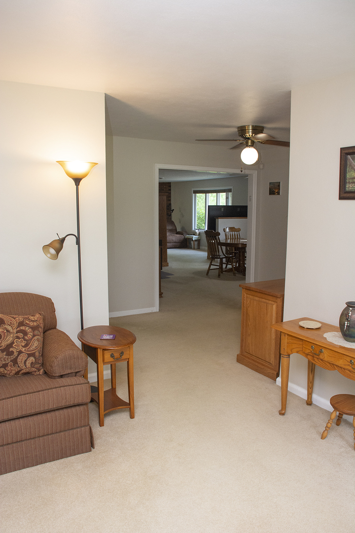 26883 Capp Road Sterling, IL 61081 - Photo 17 of 34 a living room with furniture and a couch
