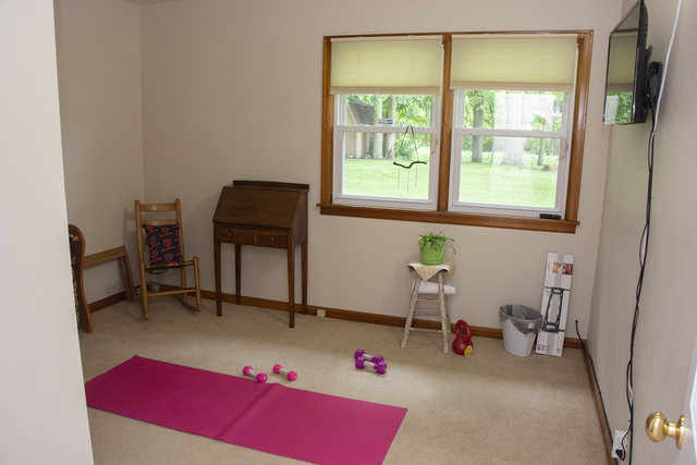 26883 Capp Road Sterling, IL 61081 - Photo 18 of 34 a living room with furniture and a window