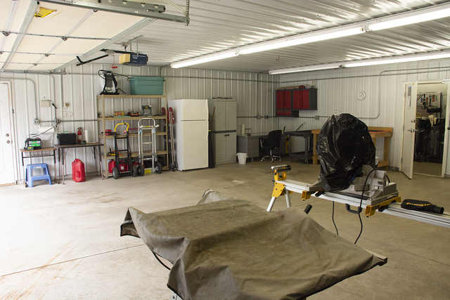 26883 Capp Road Sterling, IL 61081 - Photo 23 of 34 a room with gym equipment and a mirror