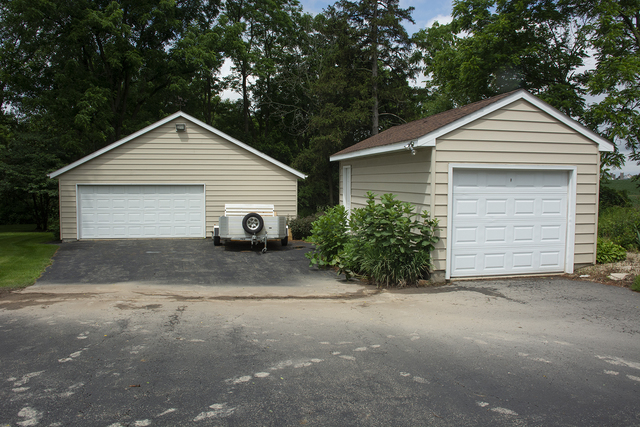 26883 Capp Road Sterling, IL 61081 - Photo 25 of 34 a view of garage and yard
