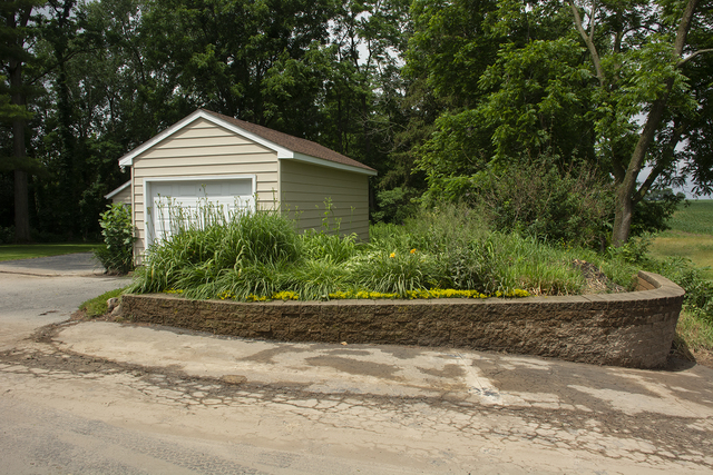 26883 Capp Road Sterling, IL 61081 - Photo 31 of 34 a front view of a house with a yard