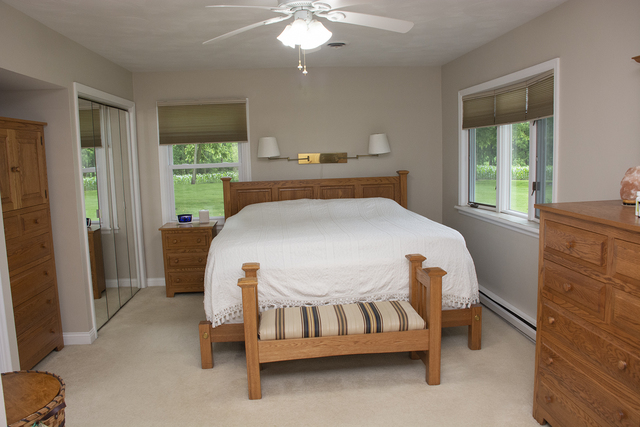 26883 Capp Road Sterling, IL 61081 - Photo 10 of 34 a bed sitting in a bedroom next to a window