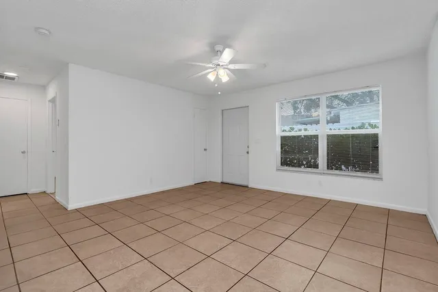 a view of an empty room and window