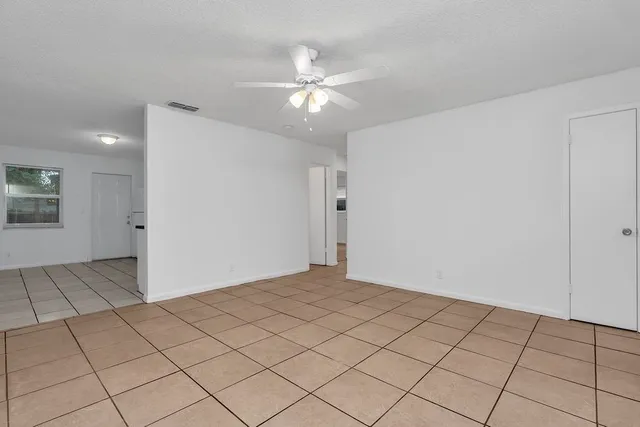 a kitchen with a sink dishwasher and cabinets