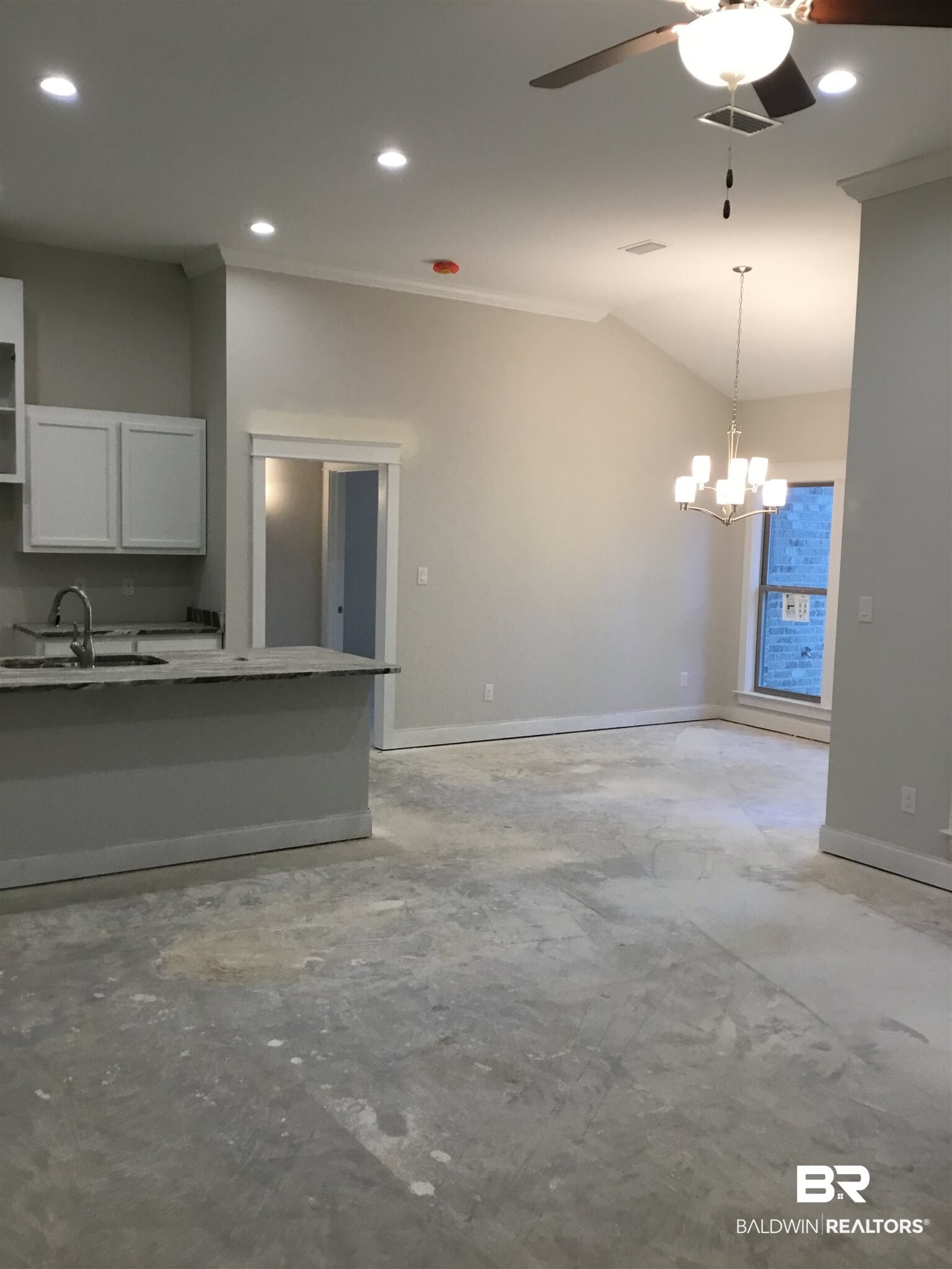 237 Divot Loop, Unit LOT 110 Fairhope, AL 36532 - Photo 10 of 32 Family room open to kitch