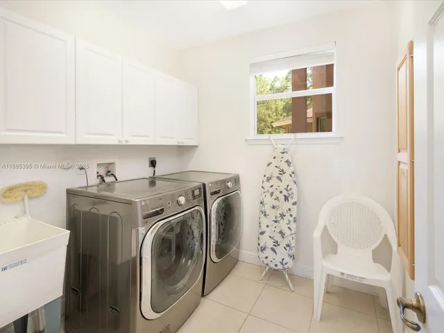 a aerial view of a house with backyard