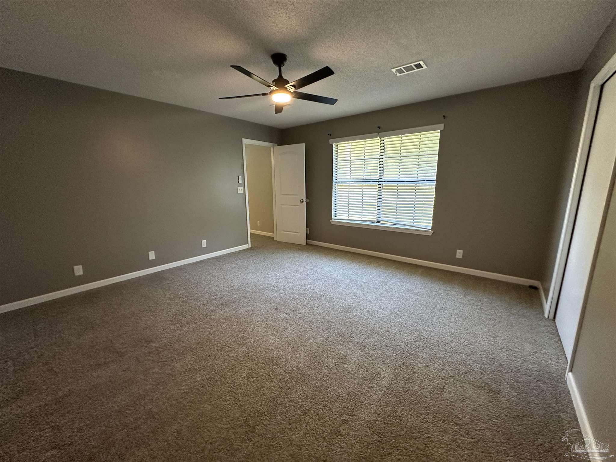7720 Jansen Road Pensacola, FL 32526 - Photo 14 of 30 a view of an empty room with a window