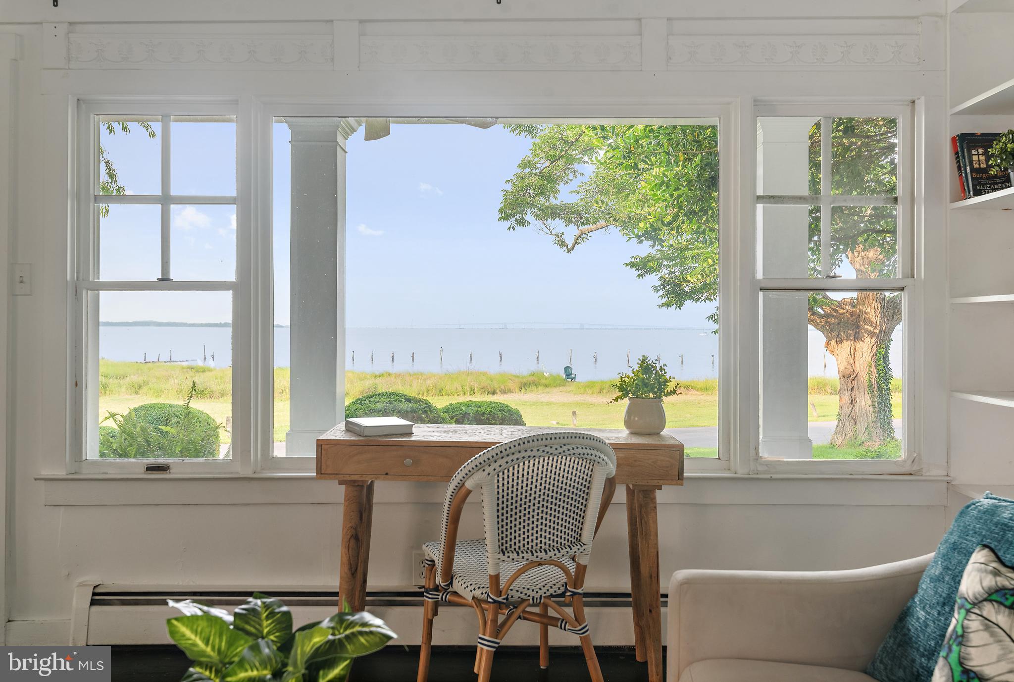 90 River Drive Annapolis, MD 21403 - Photo 15 of 44 a dining room with furniture and window