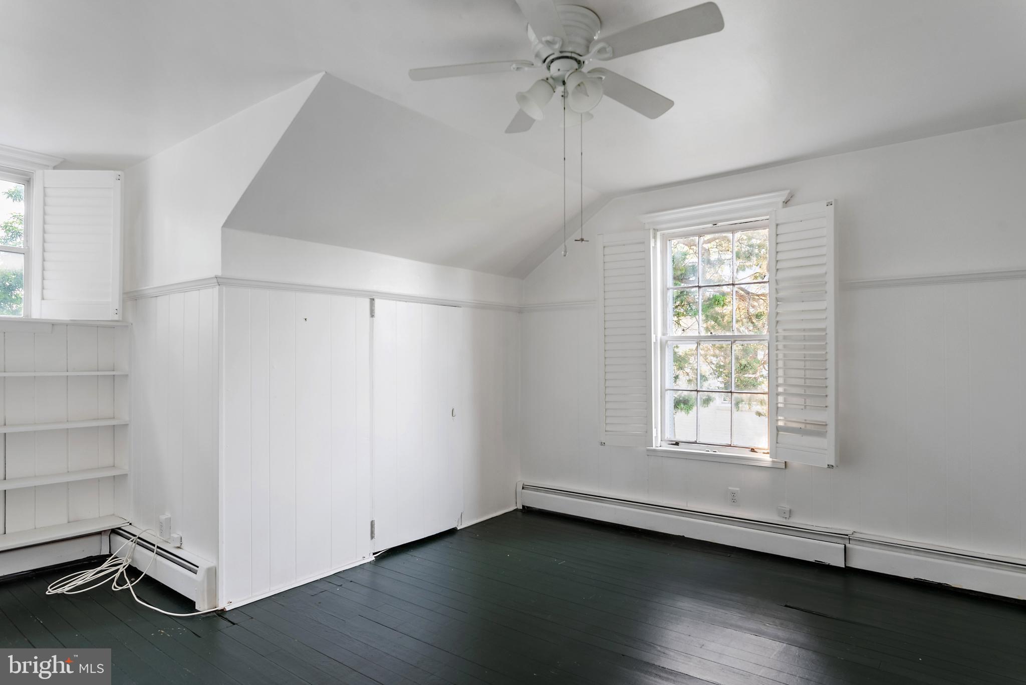 90 River Drive Annapolis, MD 21403 - Photo 32 of 44 wooden floor in an empty room with a window