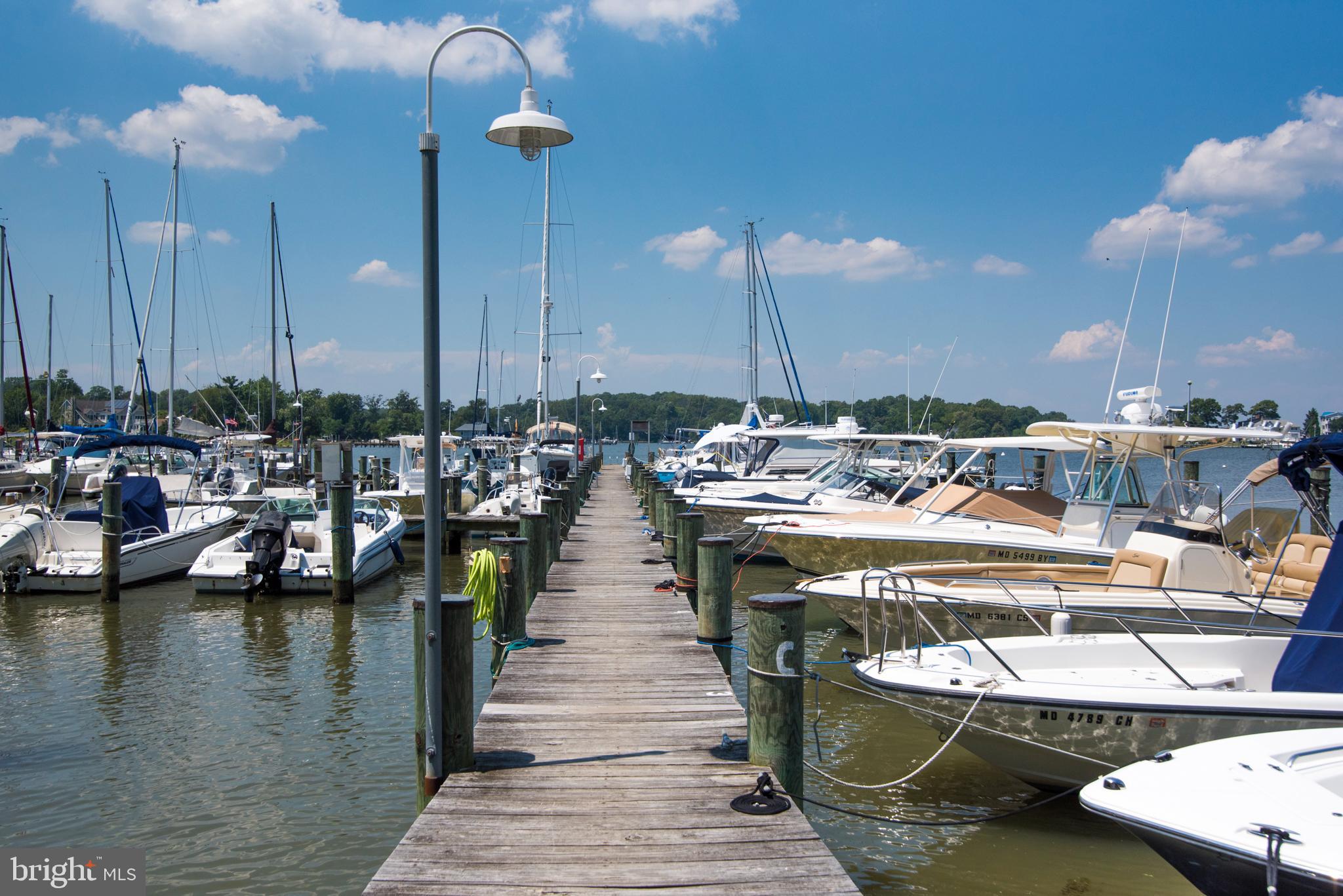 90 River Drive Annapolis, MD 21403 - Photo 40 of 44 a view of a lake with chairs