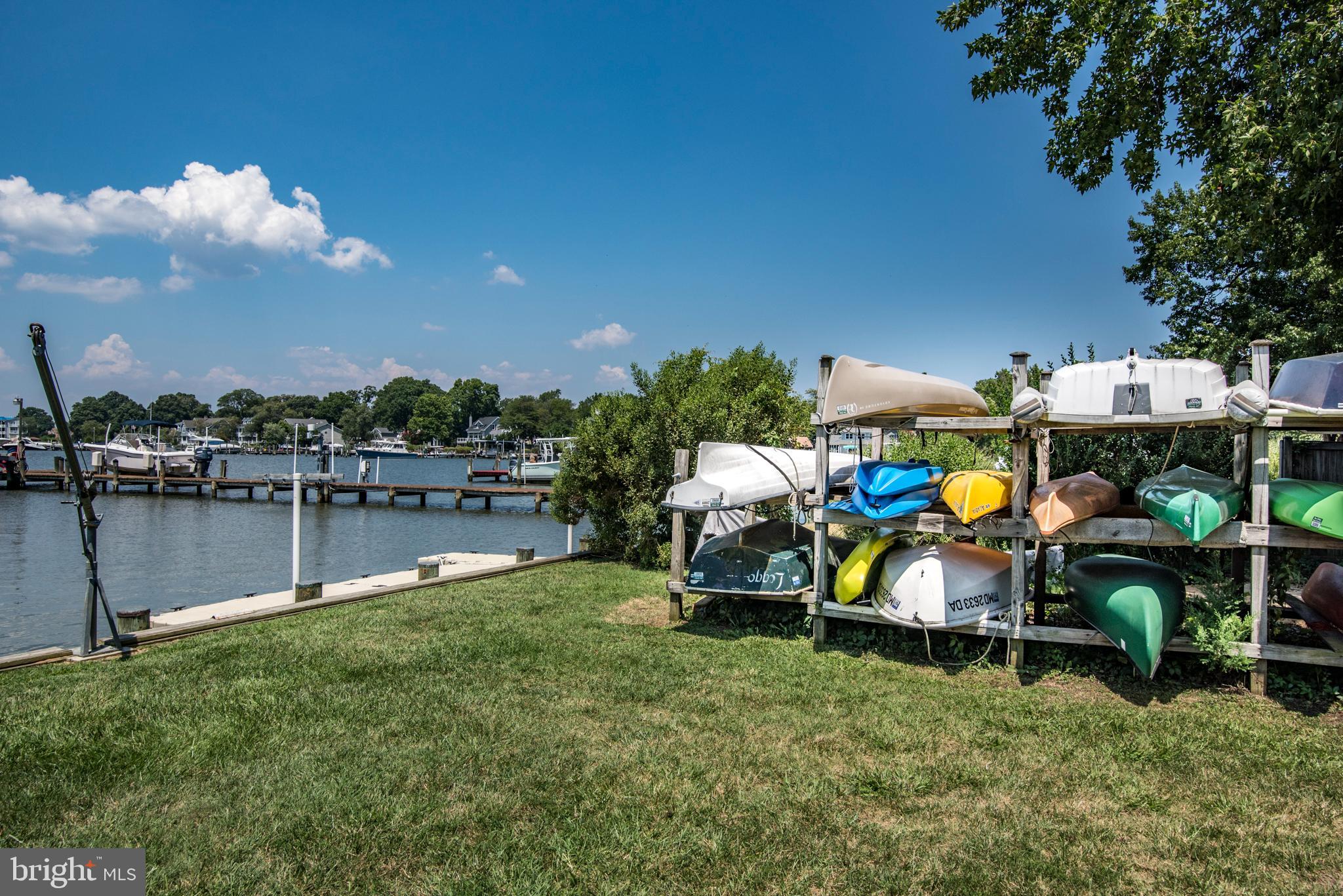 90 River Drive Annapolis, MD 21403 - Photo 42 of 44 a view of a lake with outdoor seating