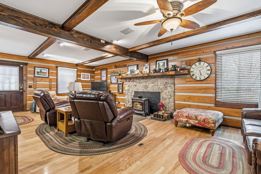 4662 Rainbow Springs Road Franklin, NC 28734 - Photo 12 of 39 a living room with furniture and a fireplace