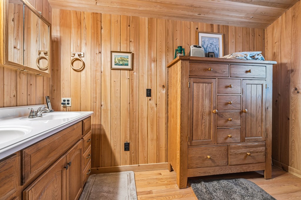 4662 Rainbow Springs Road Franklin, NC 28734 - Photo 21 of 39 a bathroom with a sink and a mirror