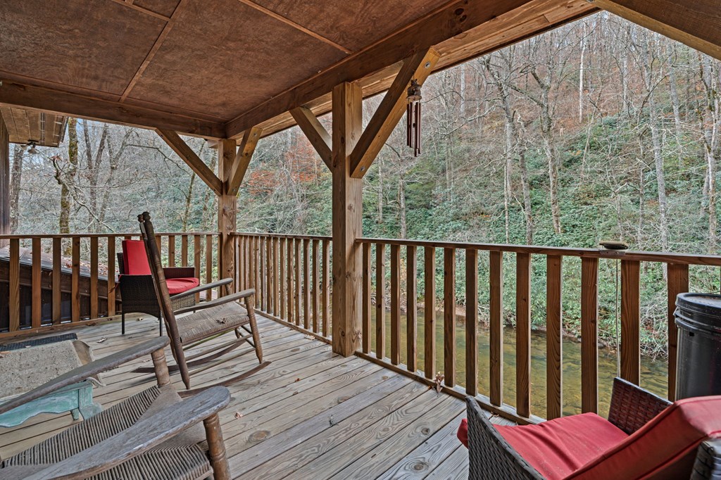 4662 Rainbow Springs Road Franklin, NC 28734 - Photo 29 of 39 a view of deck with wooden floor and outdoor seating