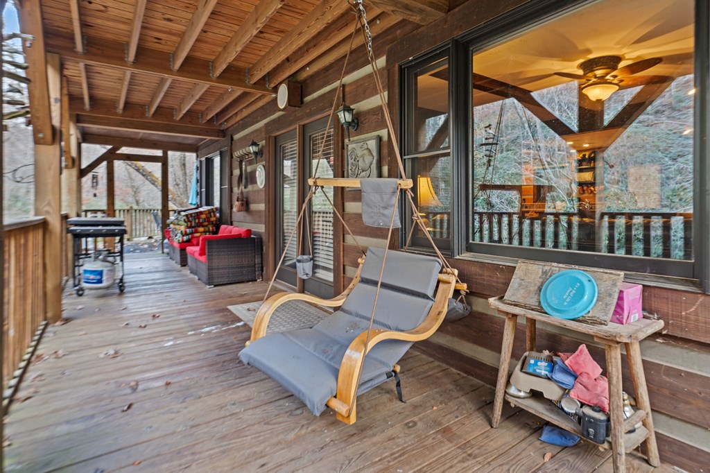 4662 Rainbow Springs Road Franklin, NC 28734 - Photo 36 of 39 a view of a chairs in wooden deck