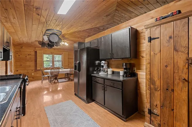 a kitchen with granite countertop lots of counter top space