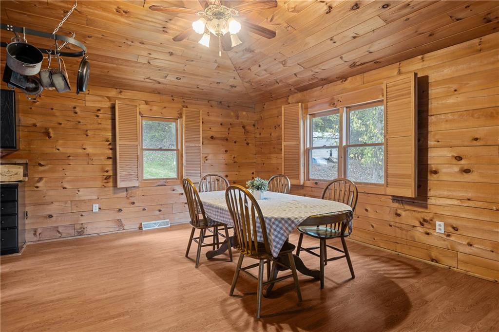 566 Pettit Road Waynesburg, PA 15370 - Photo 13 of 50 a view of a dining room with furniture window and outside view
