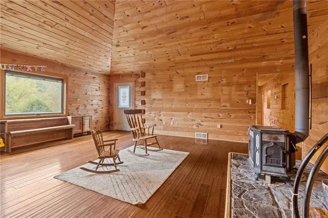 a view of room with window and hardwood floor