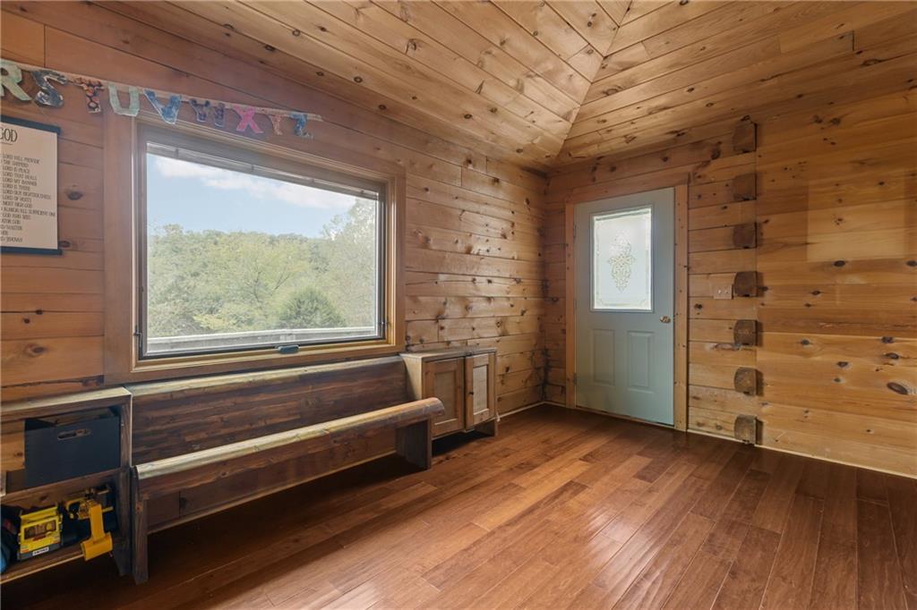 566 Pettit Road Waynesburg, PA 15370 - Photo 22 of 50 a view of room with window and hardwood floor