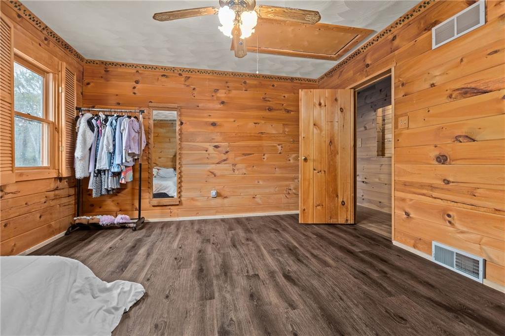 566 Pettit Road Waynesburg, PA 15370 - Photo 25 of 50 a view of a room with wooden floor and shoes