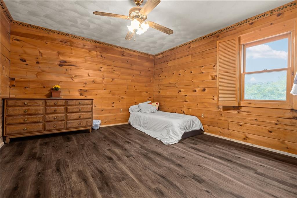 566 Pettit Road Waynesburg, PA 15370 - Photo 26 of 50 a spacious bedroom with a bed and a window
