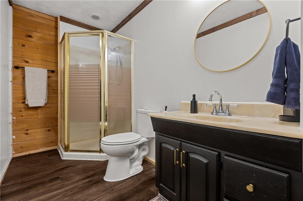 566 Pettit Road Waynesburg, PA 15370 - Photo 27 of 50 a bathroom with a sink a toilet and shower