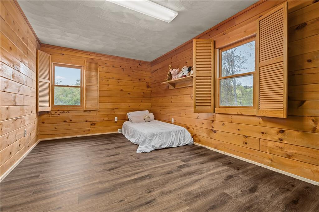 566 Pettit Road Waynesburg, PA 15370 - Photo 29 of 50 a spacious bedroom with a bed and window