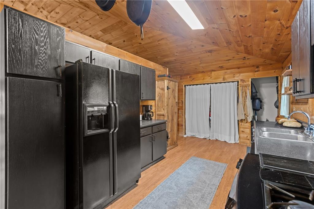 566 Pettit Road Waynesburg, PA 15370 - Photo 9 of 50 a kitchen with stainless steel appliances granite countertop a refrigerator and a stove