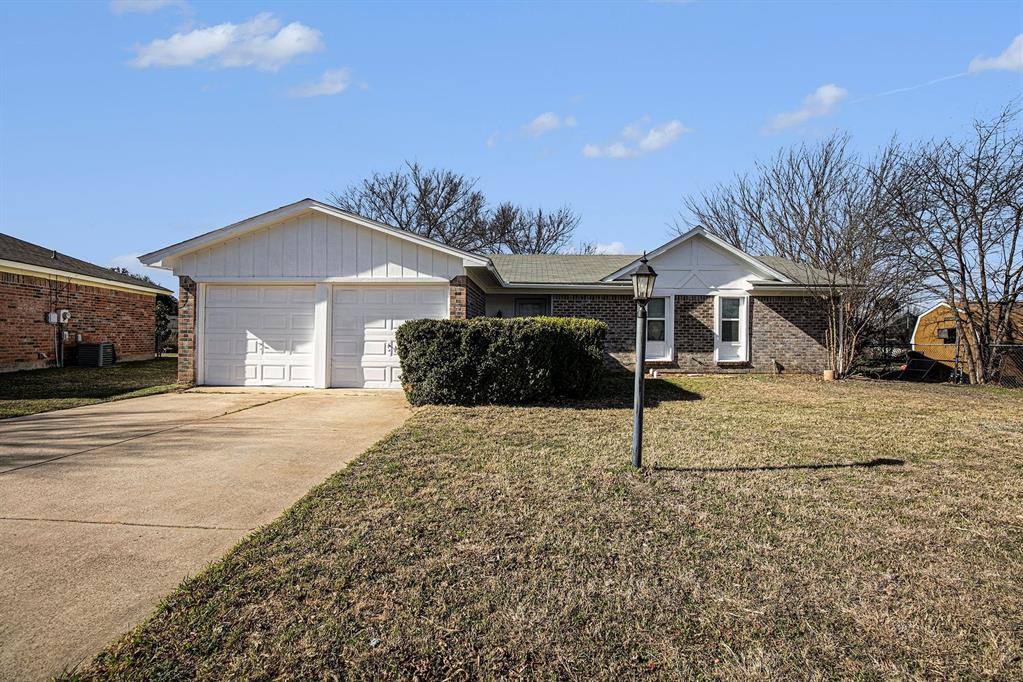 125 Roundtree Street Crowley, TX 76036 - Photo 1 of 25 a house with trees in the background