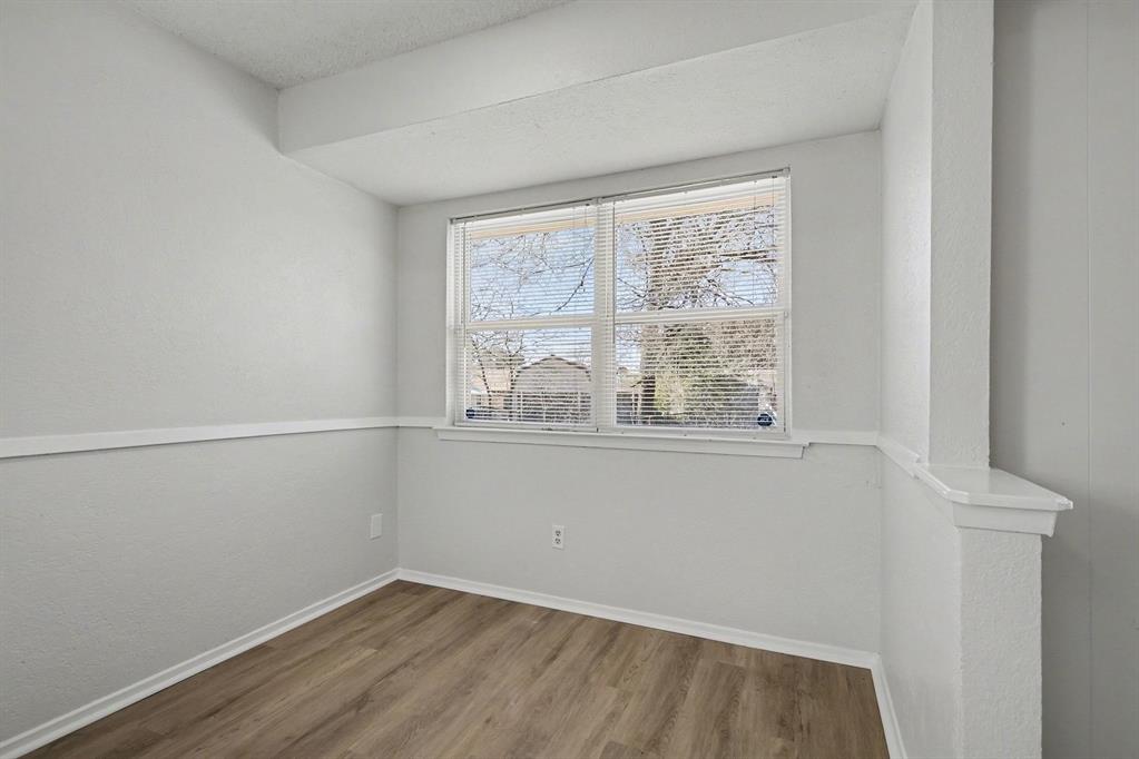 125 Roundtree Street Crowley, TX 76036 - Photo 17 of 25 a view of an empty room with a window