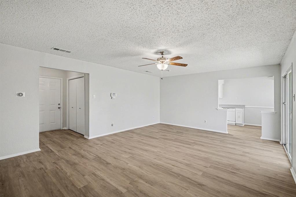 125 Roundtree Street Crowley, TX 76036 - Photo 4 of 25 a view of an empty room and a window